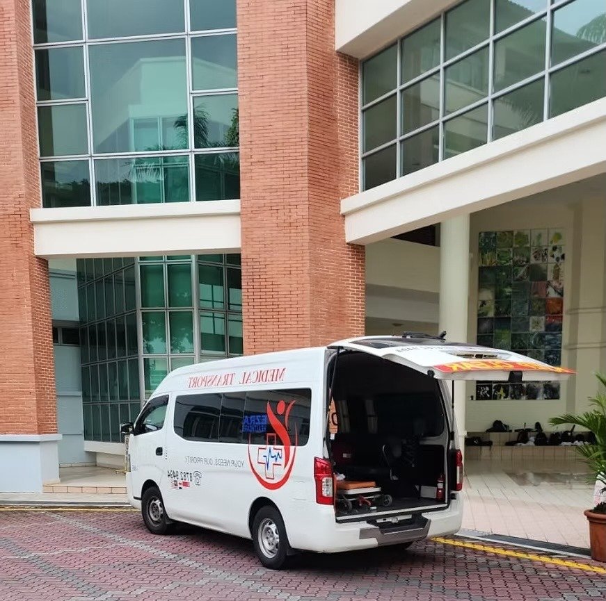 Ezra Healthcare medical transport vehicle and team